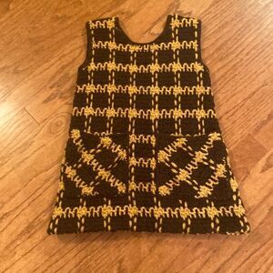 Crochet top, or short dress would be really cute with leggings and boots